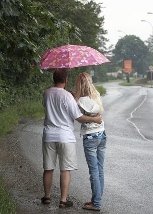 18 year old girl Megan Rain removes her sandals and then clothes to pose naked